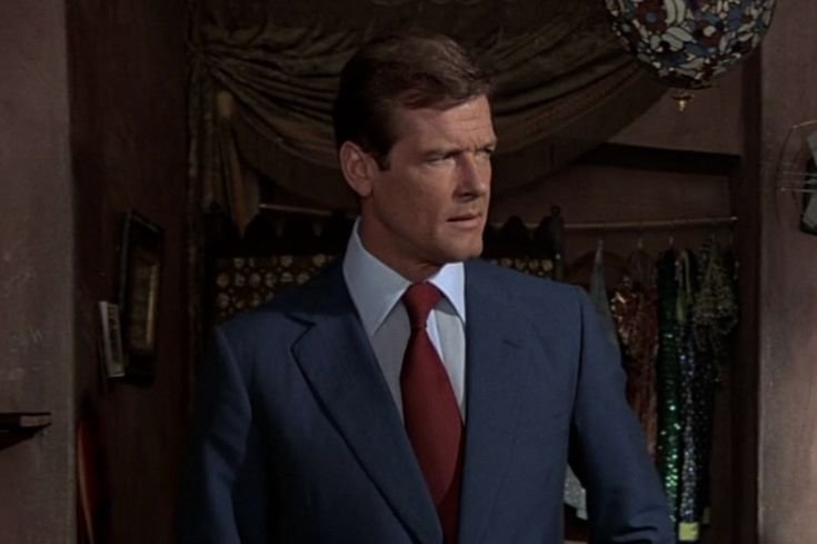 Fuh. Even Roger Moore had a blue suit. | James bond, Roger moore, Bionic woman